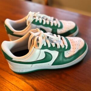 Green and White Nike Air Force 1 Sneakers